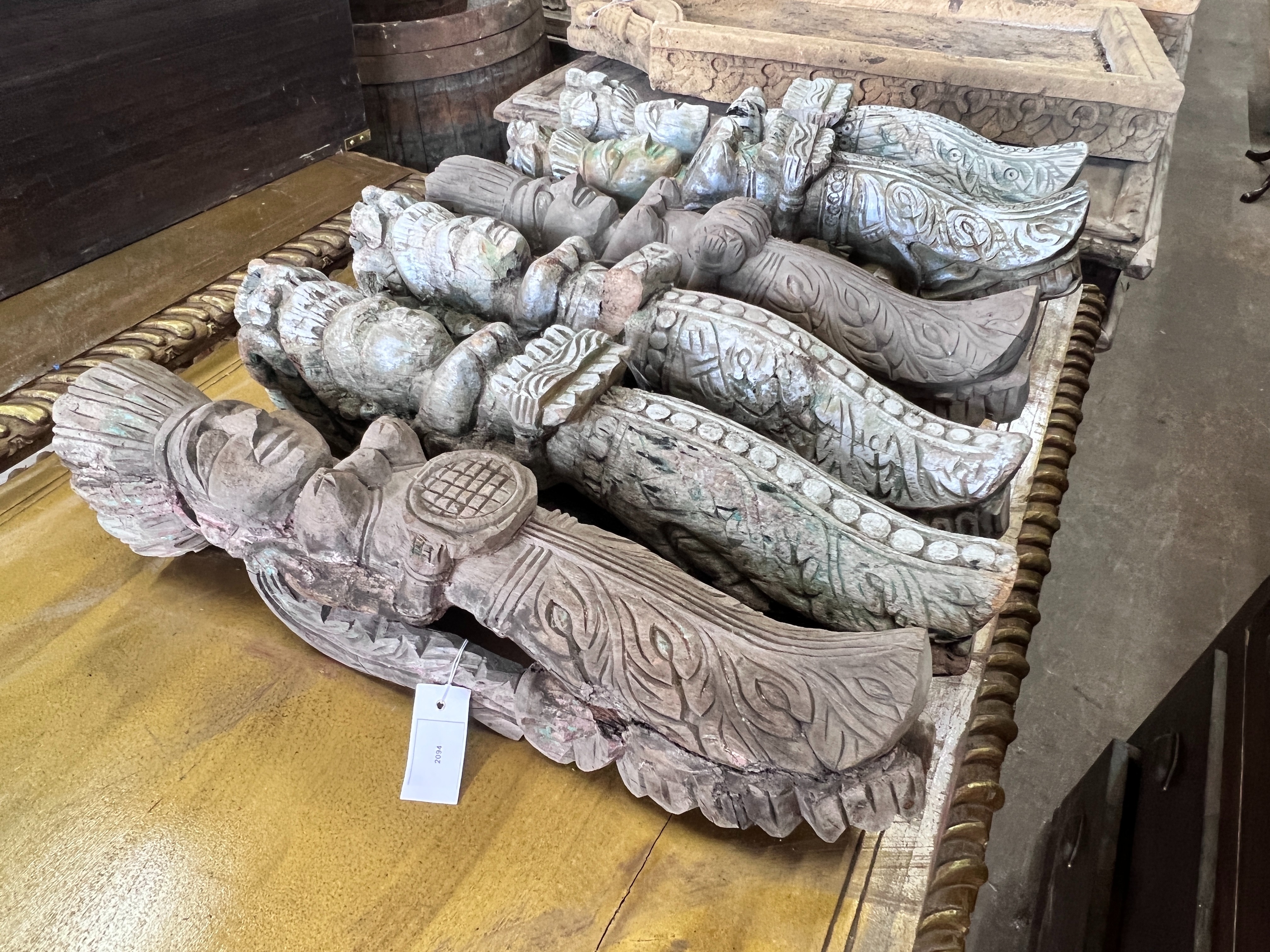 A set of six Indonesian carved hardwood figural appliques, height 60cm